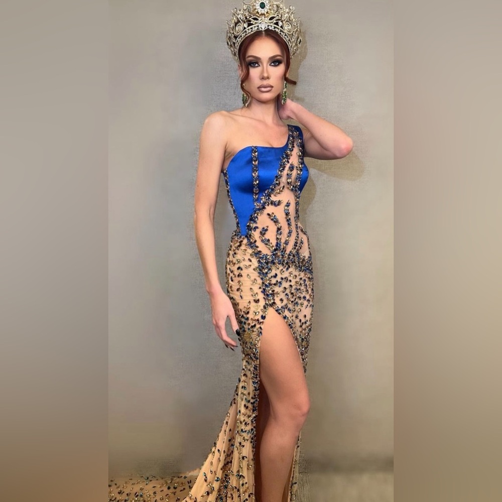 Custom one shoulder blue rhinestone embellished gown from WALONE